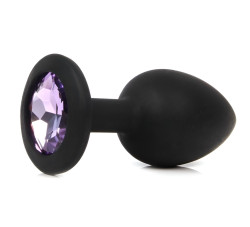Черная анальная пробка с сиреневым кристаллом - 7,3 см. Черная анальная пробка с сиреневым кристаллом - 7,3 см.